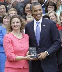 Michelle Shearer receiving the award from President Barack Obama